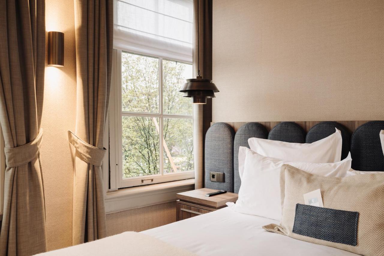 Hotel 717 Amsterdam Luaran gambar A bedroom at the hotel