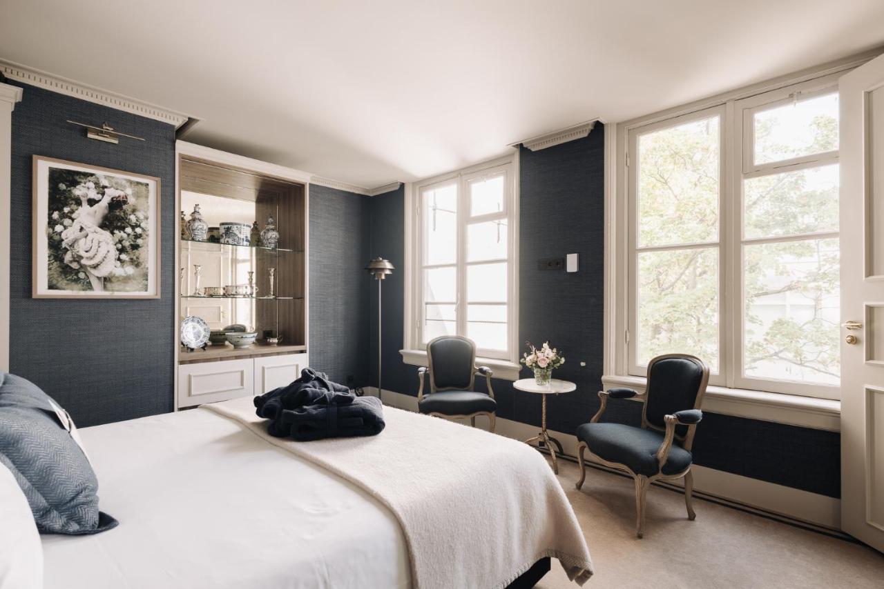 Hotel 717 Amsterdam Luaran gambar A bedroom at The Ivy Hotel